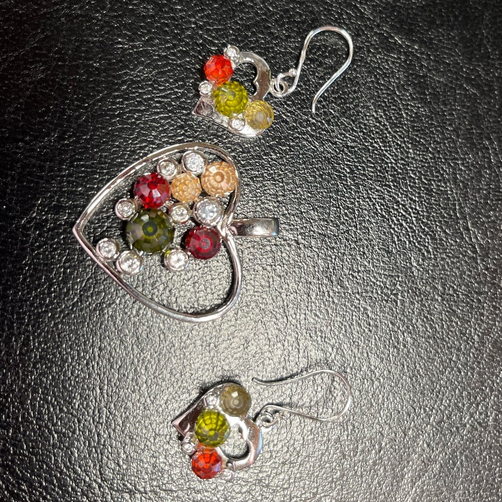 Ruby, Emerald and Brown and White Sapphires.